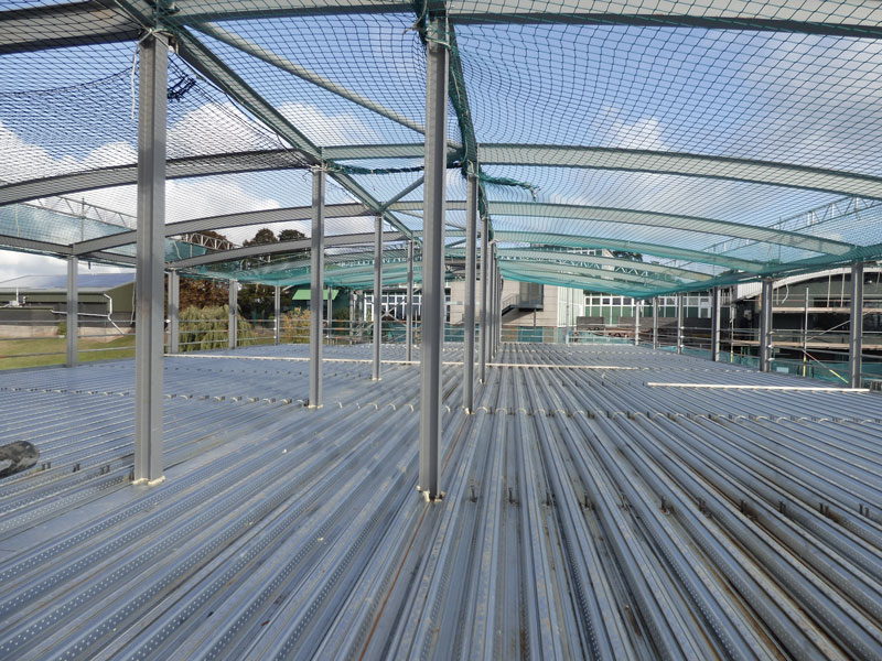 Steel frame, metal deck, concrete pour